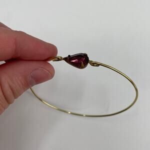 Goldtone purple gemstone bangle bracelet